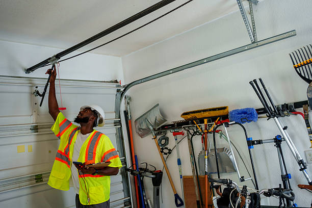 Professional Garage Door Panel Replacement technician working in Dunkirk, NY